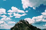 goal_setting_team_at_top_of_mountain